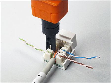 the punchdown tool pushes each wire into its channel